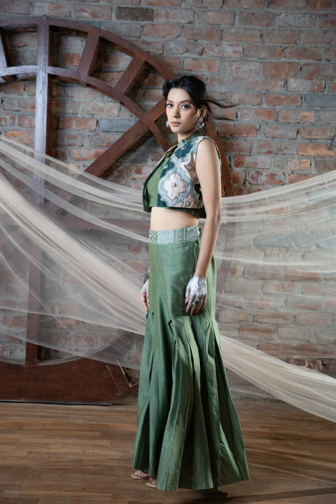 Green appliqué short jacket and plazo set with bustier