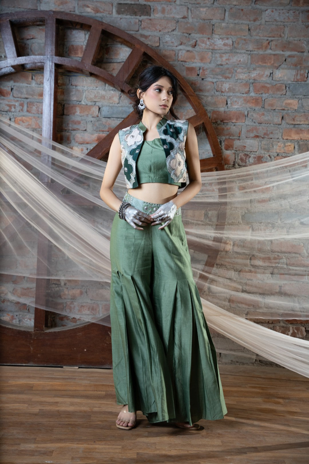 Green appliqué short jacket and plazo set with bustier